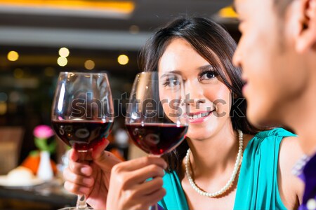 Man testing wine in background barrels Stock photo © Kzenon