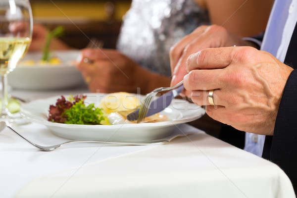 People fine dining in elegant restaurant Stock photo © Kzenon
