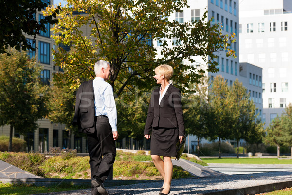 Business people greeting outdoors Stock photo © Kzenon