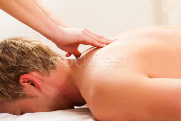 Patient at the physiotherapy - massage Stock photo © Kzenon