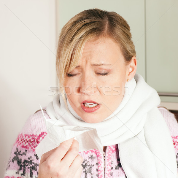 Stock photo: Woman with cold or flu sneezing