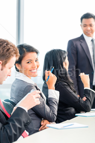 Asian Businesspeople in office team meeting Stock photo © Kzenon