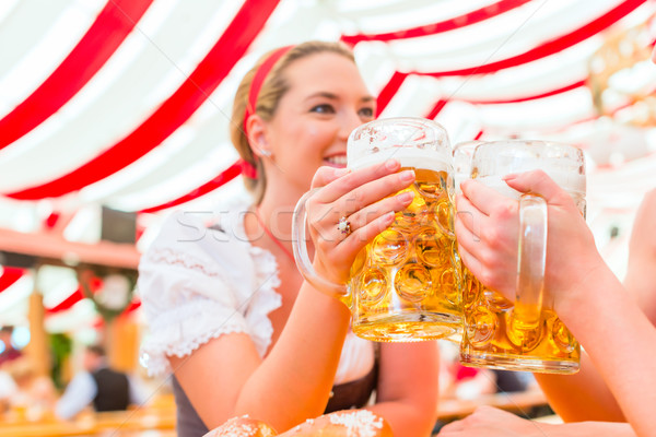 Friends drinking Bavarian beer at Oktoberfest Stock photo © Kzenon