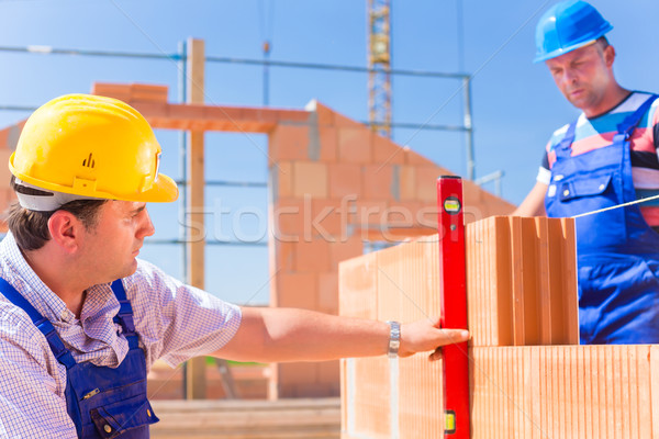 Foto d'archivio: Lavoratori · costruzione · shell · muratore · caschi