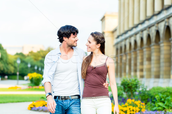 Tourist couple in city walking Stock photo © Kzenon