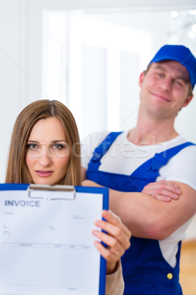 Craftsman or plumber giving overpriced invoice  Stock photo © Kzenon
