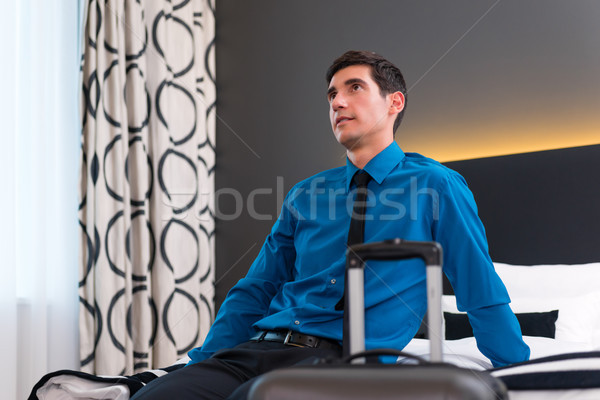 Man arriving in hotel room Stock photo © Kzenon