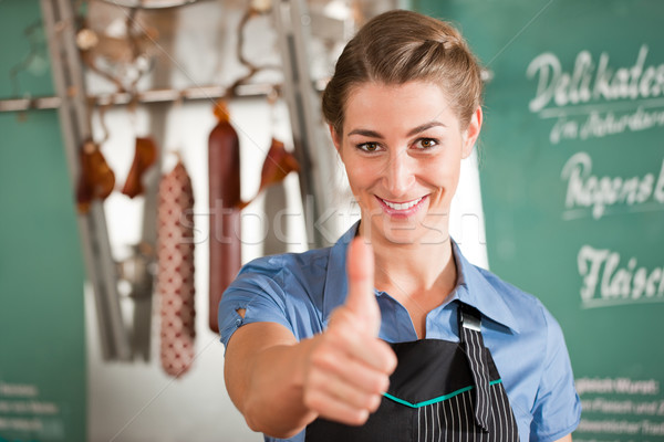 Female Butcher Showing Thumbs up Stock photo © Kzenon