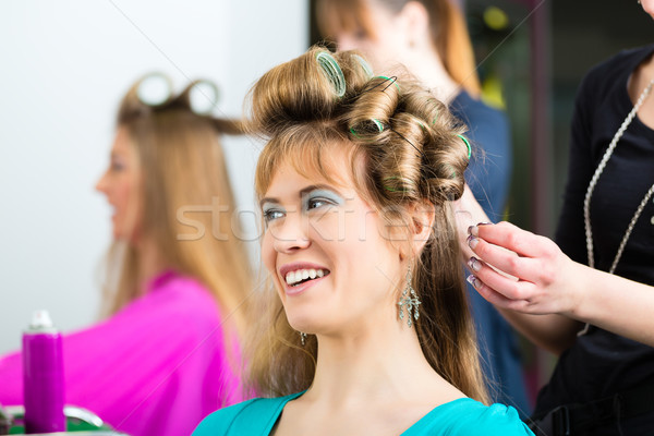 Women at the hairdresser with curls Stock photo © Kzenon