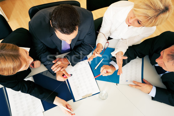 Teamwork - discussion in the office Stock photo © Kzenon