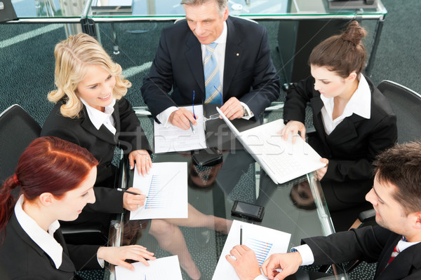Business people - meeting in an office Stock photo © Kzenon