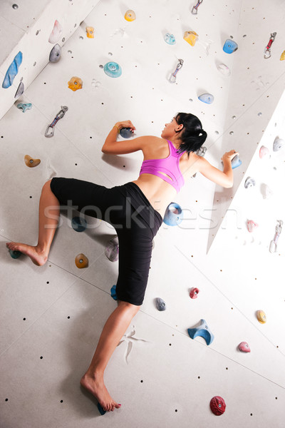 Woman at the climbing wall  Stock photo © Kzenon