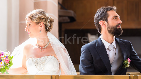 Bride and groom separating Stock photo © Kzenon