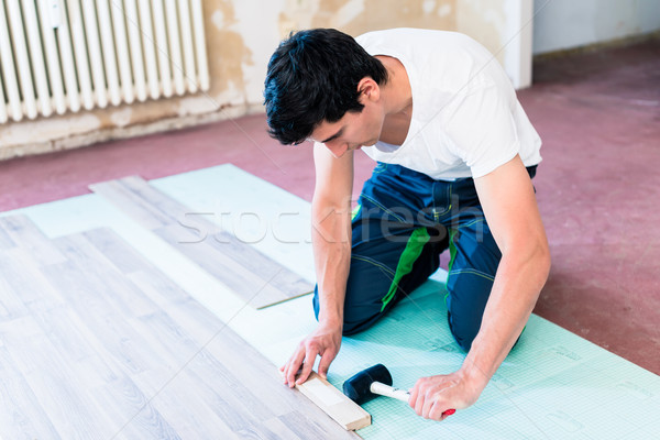 DIY workman flooring apartment floor Stock photo © Kzenon