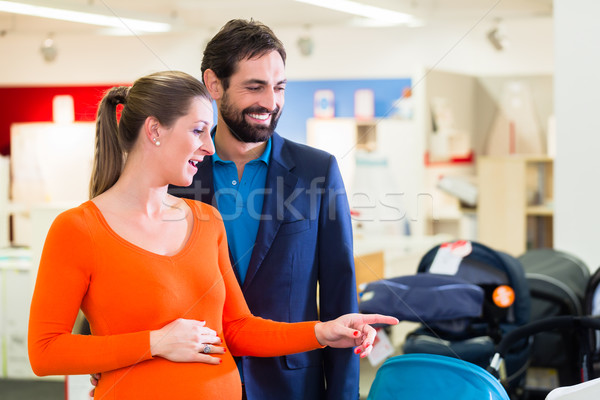 Pregnant woman and man in baby shop  Stock photo © Kzenon