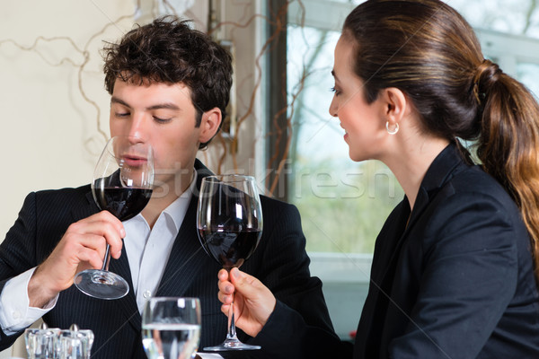 Businesspeople have a lunch in restaurant Stock photo © Kzenon