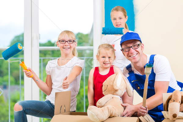 Family moving home and renovating house Stock photo © Kzenon