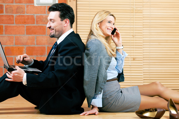 Business couple is working at home Stock photo © Kzenon