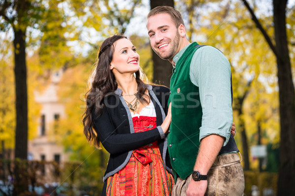 Happy Couple with Tracht in Bavaria Stock photo © Kzenon