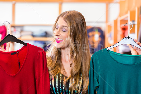 Woman shopping in fashion shop Stock photo © Kzenon