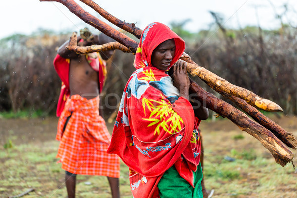 Massai man collecting firewood Stock photo © Kzenon