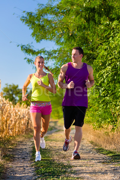 Man and woman running for sport  Stock photo © Kzenon