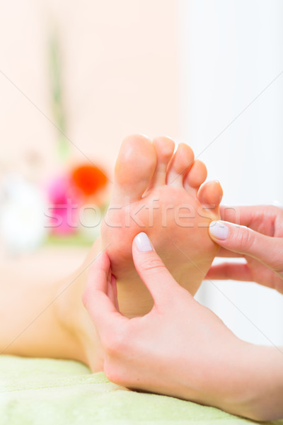 Stock photo: Woman in nail salon receiving foot massage