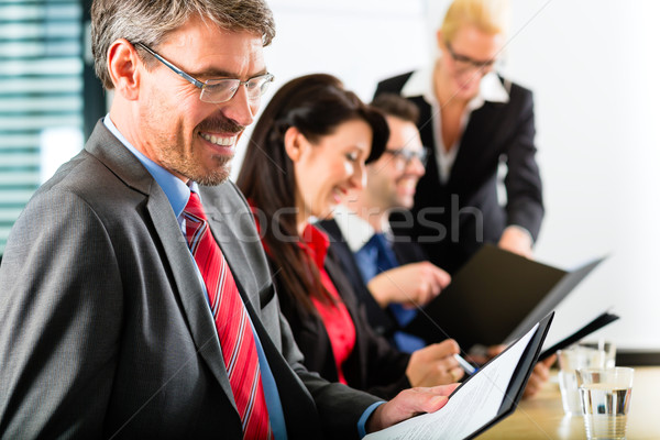 Business - businesspeople have team meeting Stock photo © Kzenon