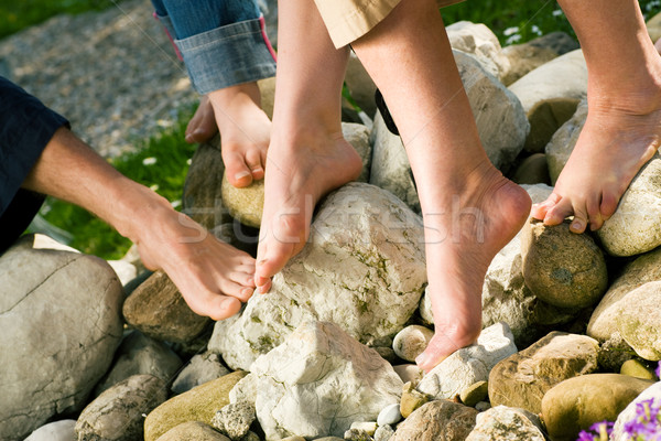 Healthy feet - on the stones Stock photo © Kzenon