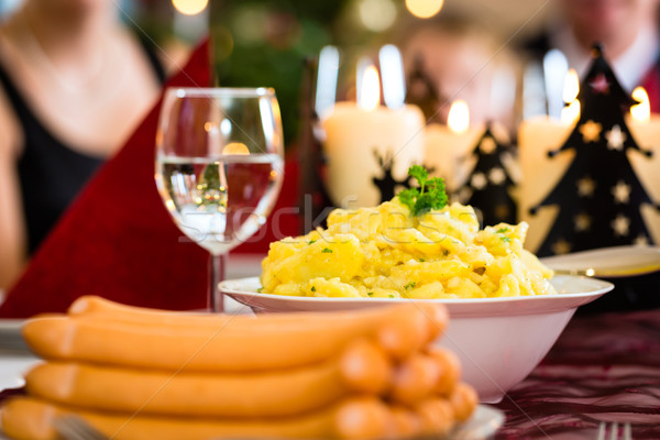 German Christmas dinner sausages and potato salad Stock photo © Kzenon