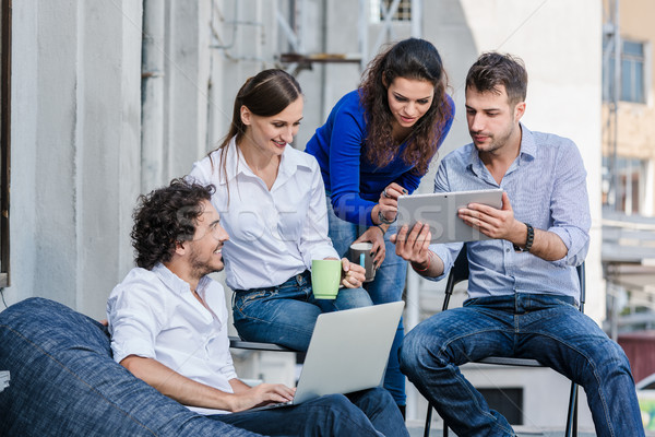 équipe brainstorming bureau terrasse extérieur homme [[stock_photo]] © Kzenon