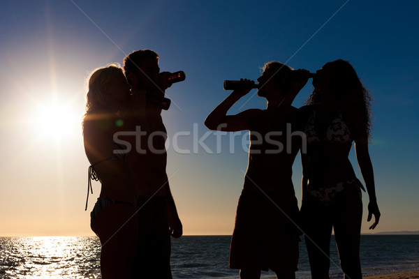 Mensen partij strand dranken twee paren Stockfoto © Kzenon