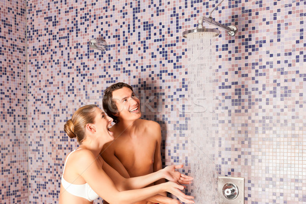 Young couple under experience shower Stock photo © Kzenon