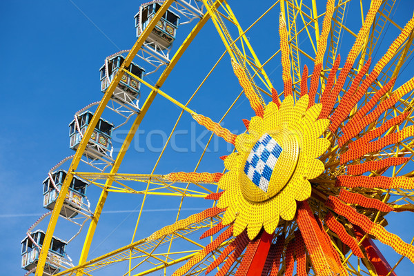 Big wheel in front of blue sky  Stock photo © Kzenon