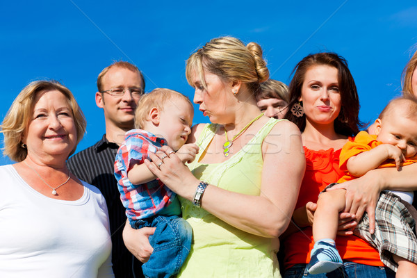 Stock photo: Family and multi-generation - fun on meadow in summer