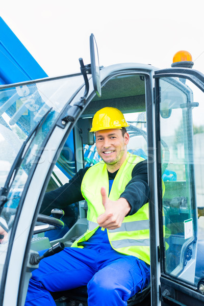 Driver driving  construction excavator Stock photo © Kzenon