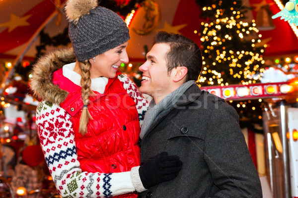 Couple during  the Christmas market or advent season Stock photo © Kzenon