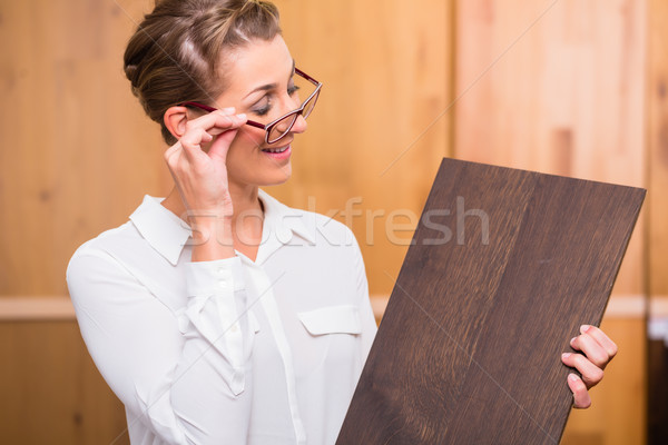 Interior architect choosing parquet wood floor Stock photo © Kzenon