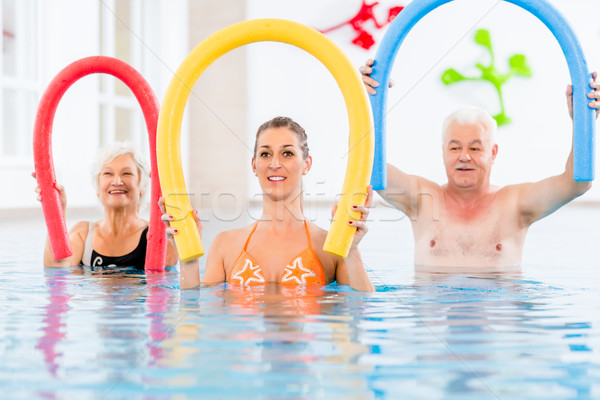Stock photo: Group in aquarobic fitness swimming pool