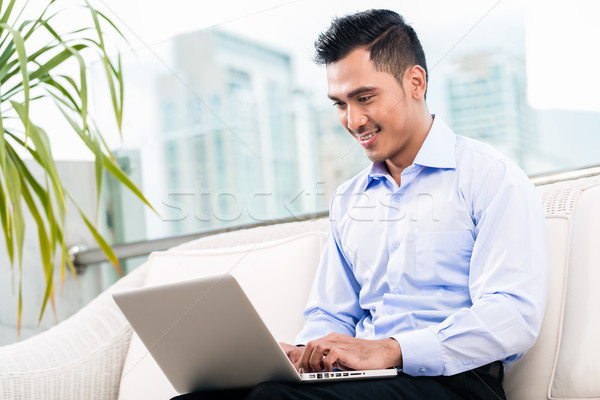 Businessman working with laptop from home Stock photo © Kzenon