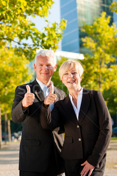 Business people in a park outdoors Stock photo © Kzenon