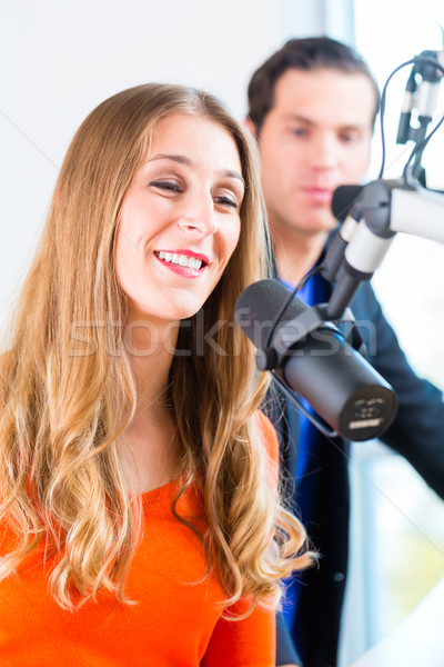 radio presenters in radio station on air Stock photo © Kzenon