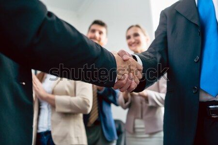 Close-up of the handshake of two business men after an important agreement Stock photo © Kzenon