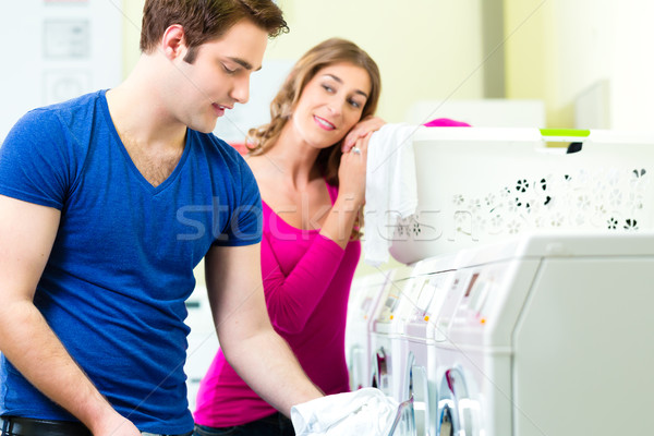 couple in a coin laundry washing Stock photo © Kzenon