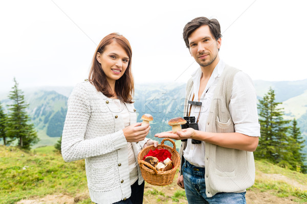 Young mushroom pickers in the Bavarian alps Stock photo © Kzenon