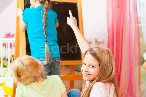 Children playing school at home Stock photo © Kzenon