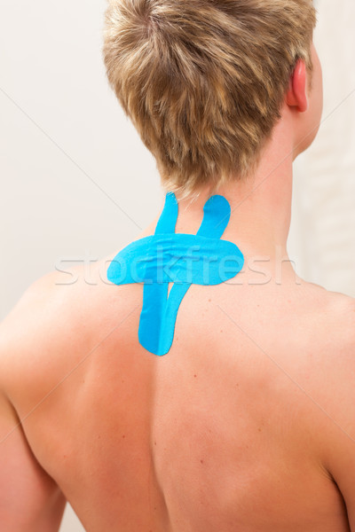 Stock photo: Patient at the physiotherapy with tape