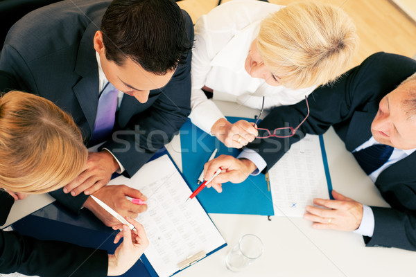 Teamwork - discussion in the office Stock photo © Kzenon