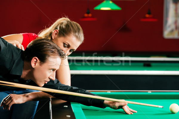 Pár játszik biliárd férfi nő biliárd Stock fotó © Kzenon