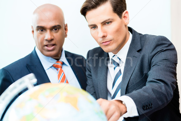 business men discussing offshoring project Stock photo © Kzenon